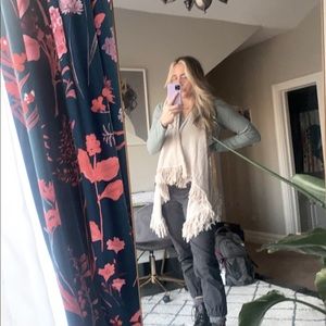 Cream fuzzy fringe vest